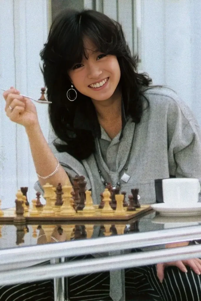 Japan curly hair style 26 — wispy textured curls on Japanese woman with natural movement
