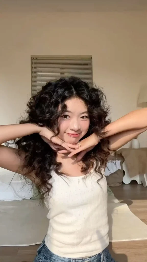 Elegant spiral curls Japan curly hair style on Japanese woman with dark hair