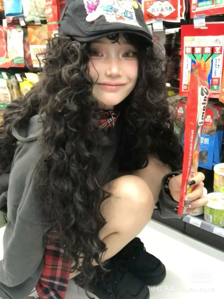 Tight spiral curls Japan curly hair — bold defined ringlets on Japanese woman 2026